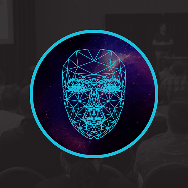 Polygonal human face overlayed on people at a conference.
